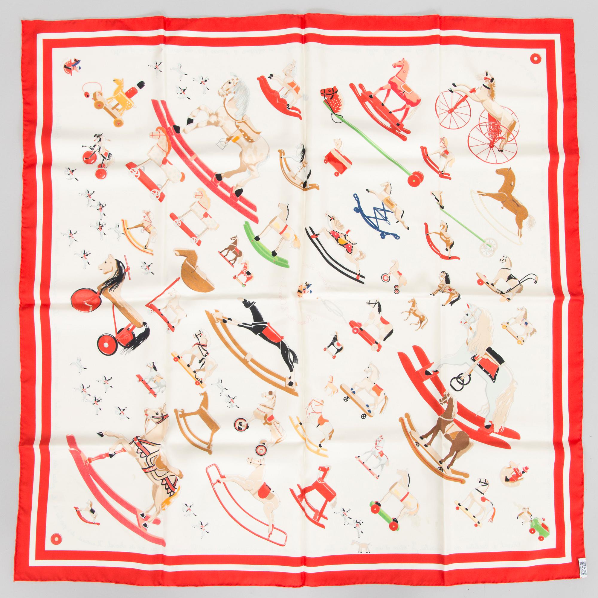 Hermès, a 'Raconte-moi le Cheval' silk scarf.