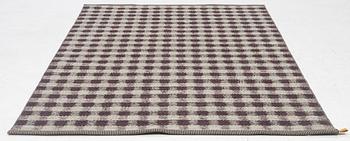 A flat weave "Vichy" carpet from Kasthall, c. 198 x 136 cm.