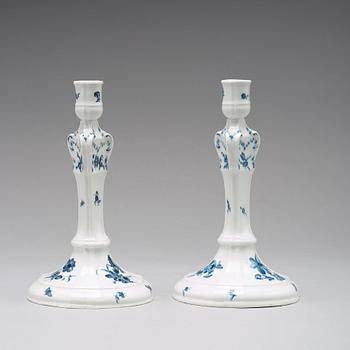 A pair of Berlin porcelain candle sticks, 18th Century.