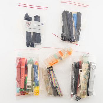 Parti med 21 Swatch-klockor, gummiband och klocklitteratur, "No Reserve".