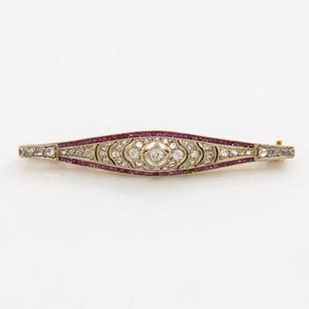 Brooch, 18K gold set with rose-cut and old mine-cut diamonds and probably synthetic rubies, circa 1900.