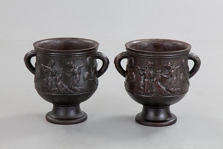 Ivar Johnsson, a pair of Swedish Grace cast iron jardinières, 'Diana' by Näfveqvarn, Sweden 1920's.