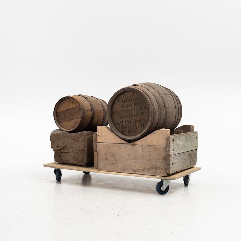 A pair of oak wine casks on stands, early 20th century.