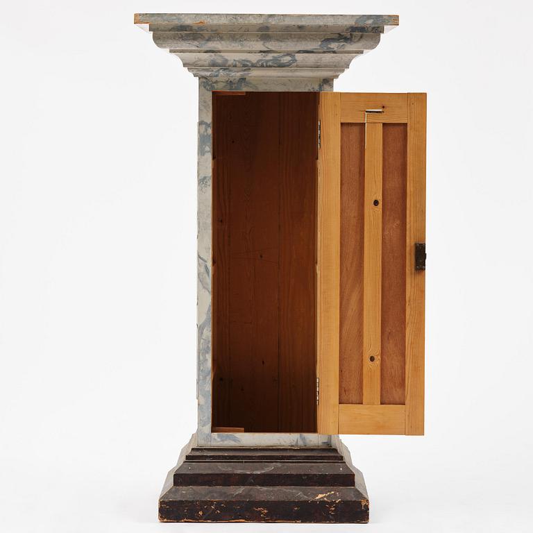 A Swedish column-shaped cabinet late 19 th century.