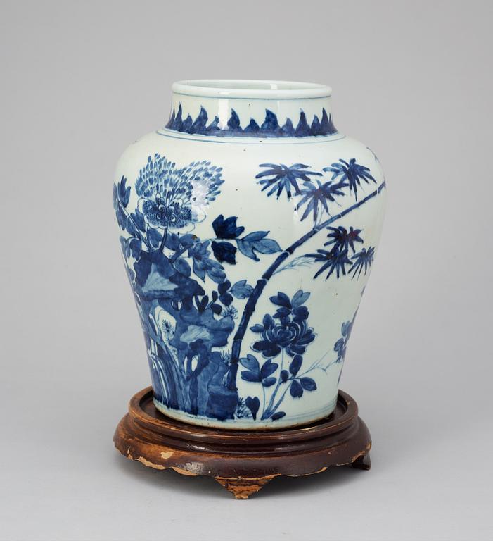 A blue and white Qing dynasty urn.