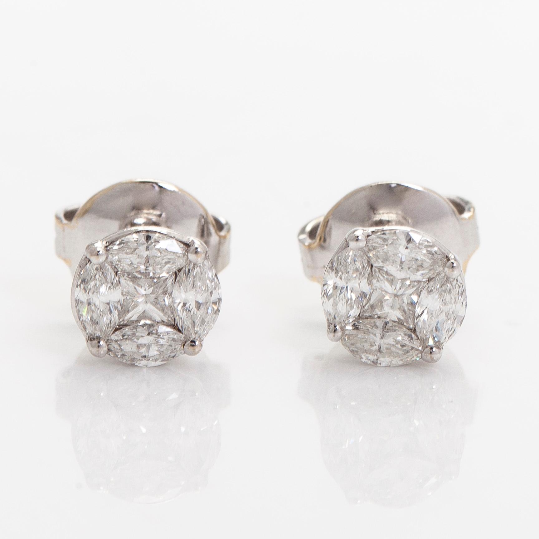 Earrings, princess- and marquise cut diamonds, 18K white gold.