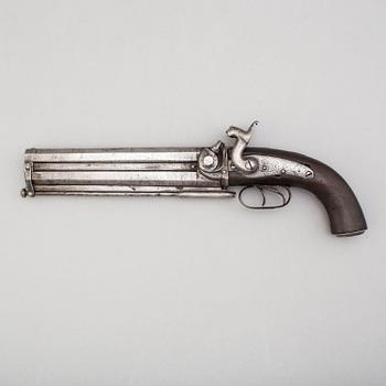 A second part of the 19th century double barreled over-and-under percussion pistol.