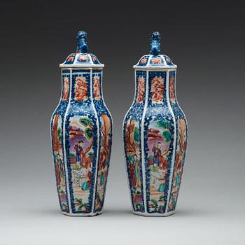 A pair of famille rose and underglaze blue vases with covers, Qing dynasty, Qianlong (1736-95).