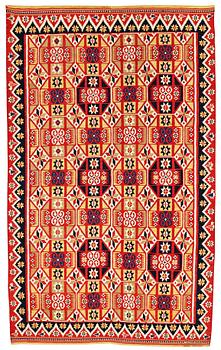 A BED COVER, double-interlocked tapestry (flat weave), ca 217 x 130,5 cm, Scania around 1830,
