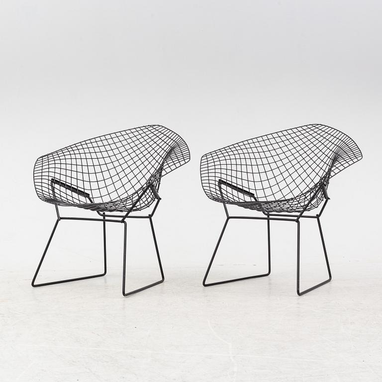 Harry Bertoia, a pair of metal lounge chairs, 1960's.