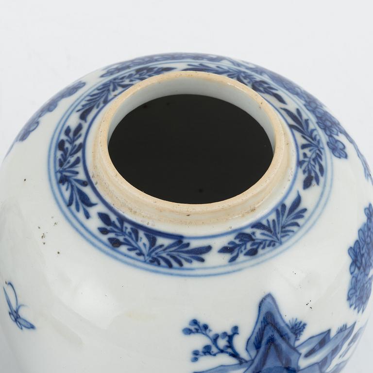 Two similar blue and white lidded urns, China, 19th century.