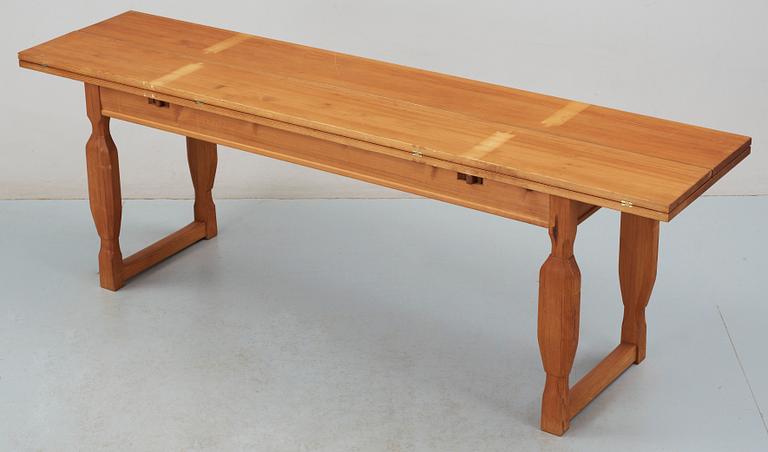 A Carl Malmsten oregon pine dinner table.