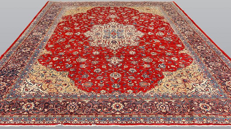 A Sarouk carpet, approximately 365 x 277 cm.