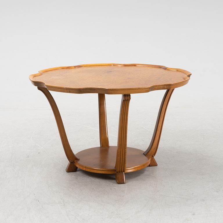 A Swedish Modern root veneer coffee table, Nordiska Kompaniet 1943.
