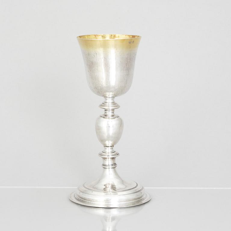 An 18th century parcel-gilt silver cup, makers mark A.M, probably Germany.