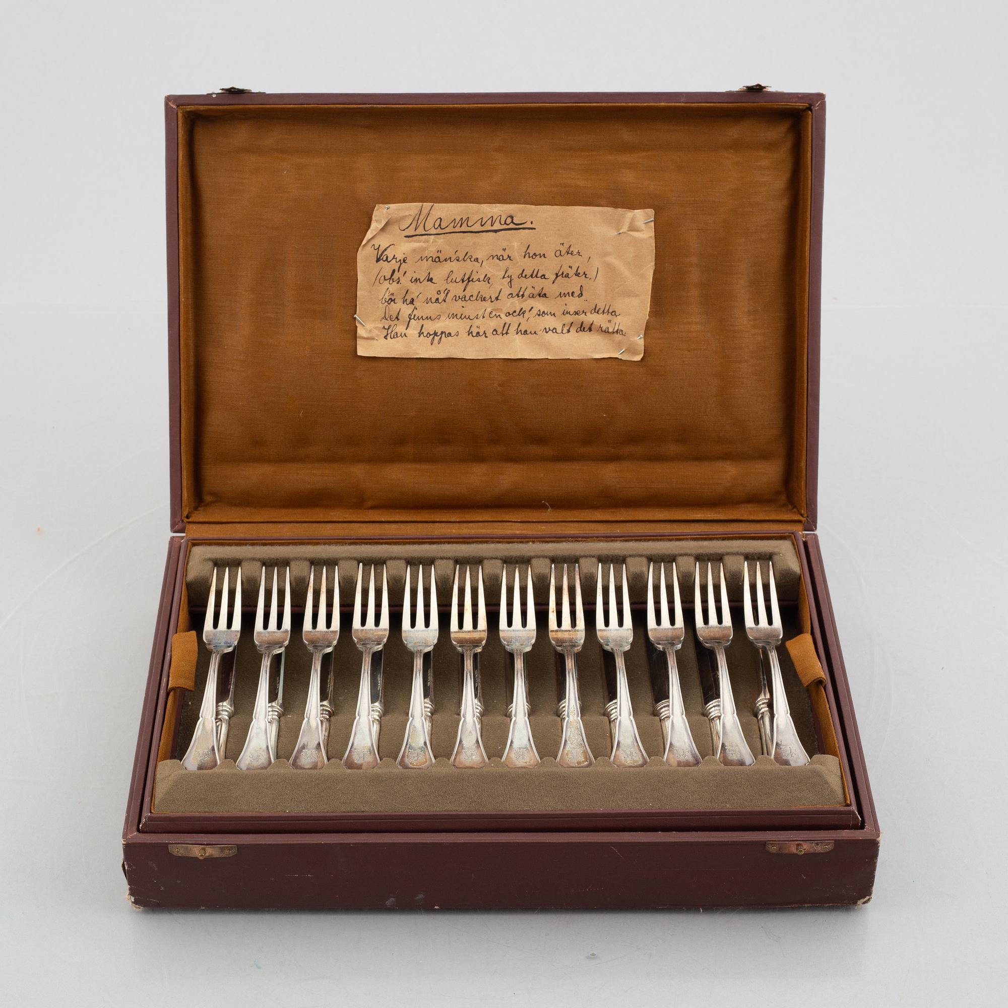 A set of 24 silver fruit knives and forks by Hanna Persson, Kristianstad, Sweden, 1923.