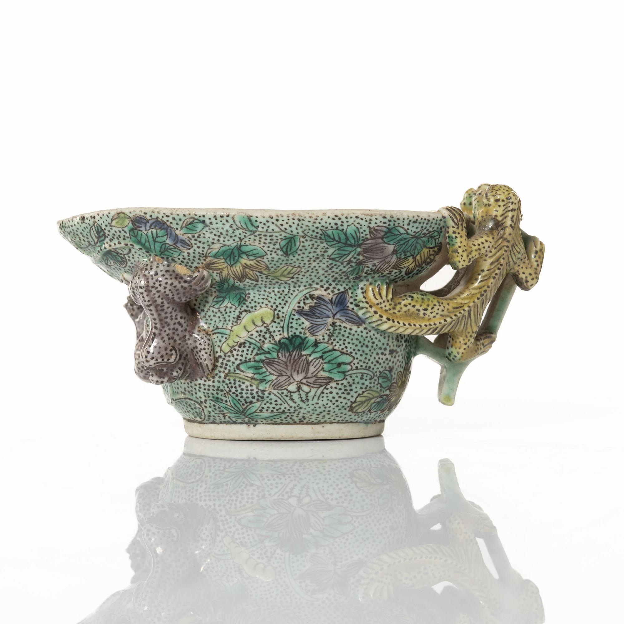A famille verte bisquit wine cup, Qing dynasty, Kangxi (1662-1722).