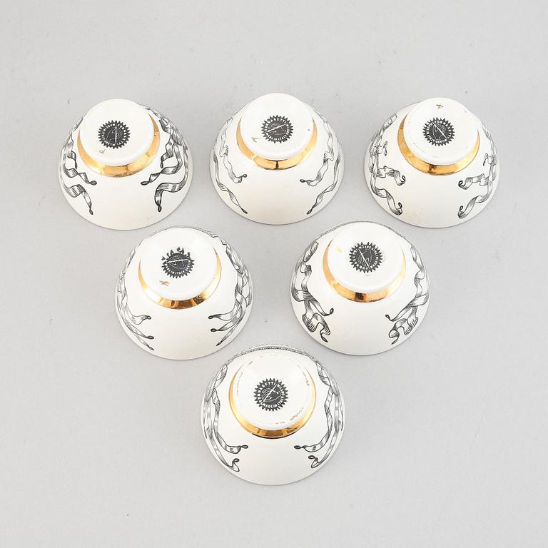 Piero Fornasetti, a set of six porcelain bowls, Milan, Italy.