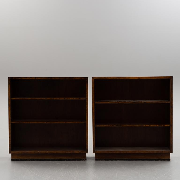 A pair of 1930's birch art deco bookcases.