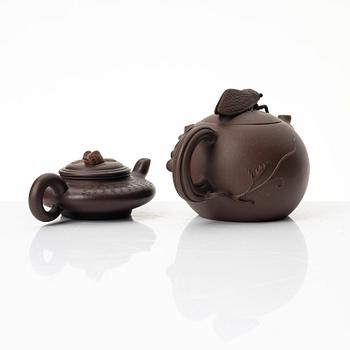 Two yixing teapots, China, 1980s and 2000.