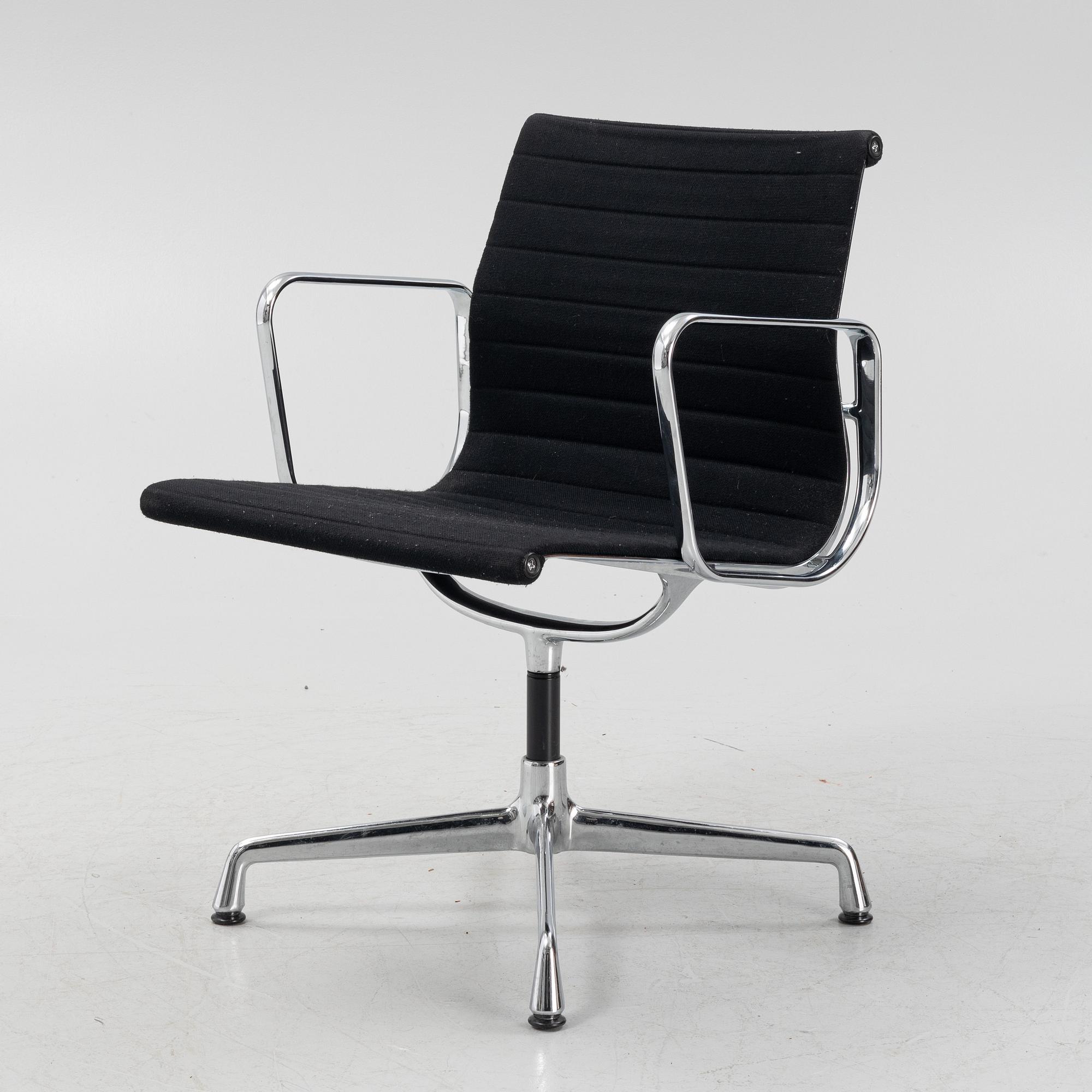 Charles and Ray Eames, an EA 108 aluminum swivel armchair from Vitra.