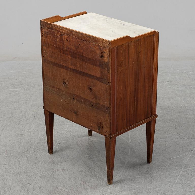 A Swedish late Gustavian mahogany with marble top bedside table, ca 1800.