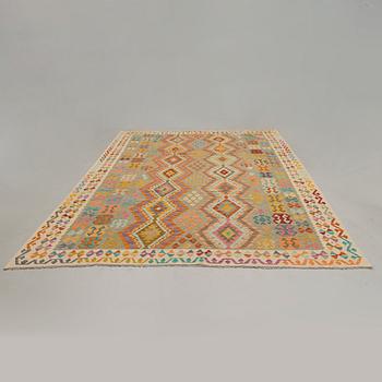 A Kelim carpet. Circa 290x250 cm.