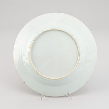 A set of two blue and white serving dishes, and two famille rose dinner plates, Qing dynasty, Qianlong (1736-95).