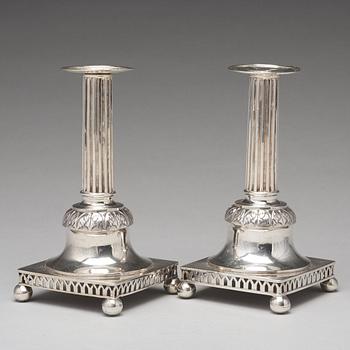 A pair of Swedish aerly 19th century silver candlesticks, mark of Carl Gustaf Blomborg, Stockholm 1815.