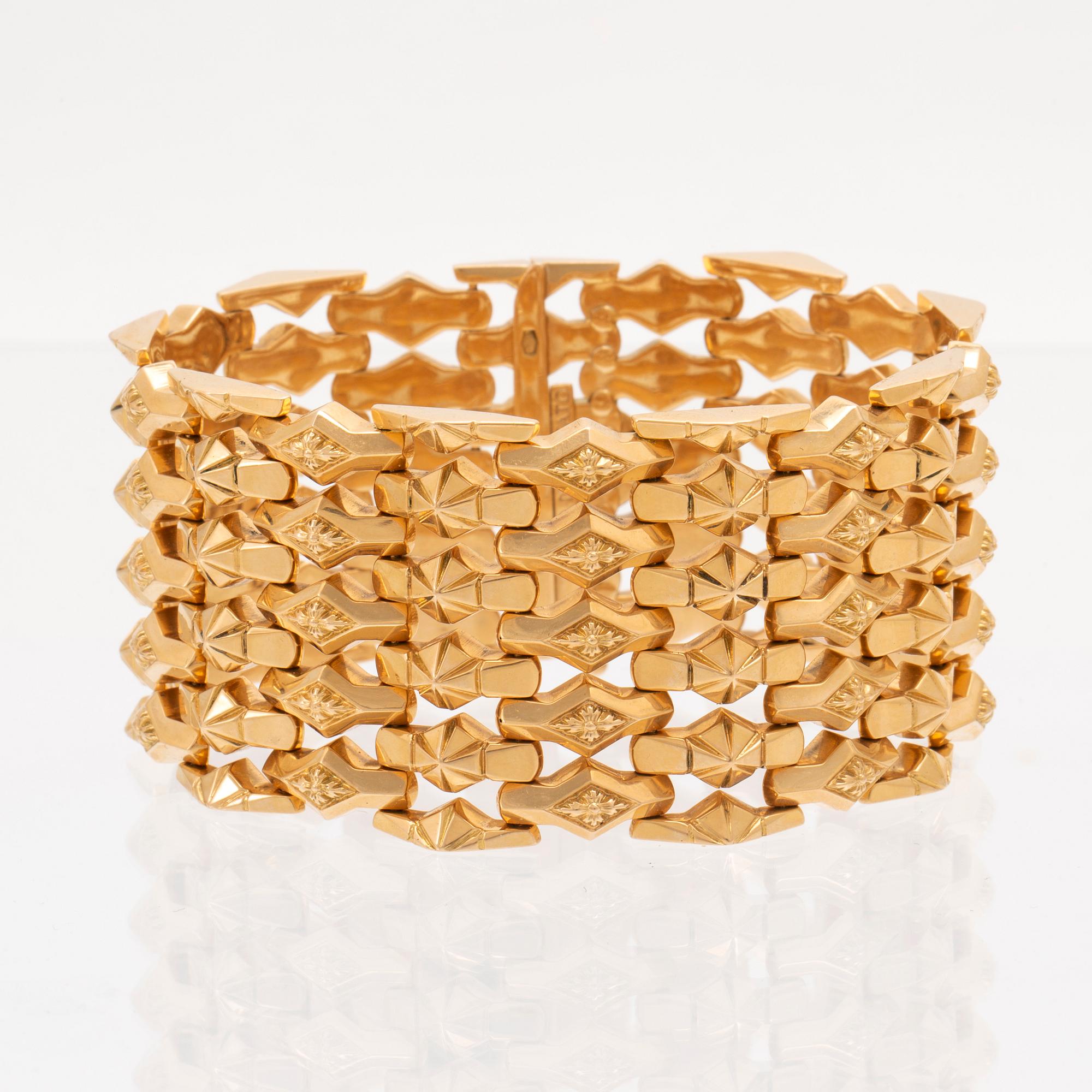 An 18C gold bracelet weight 67,6 grams length 19,5 cm.