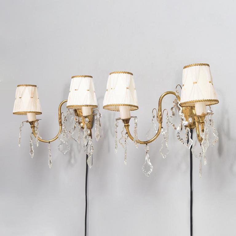 Mauri Almari, a pair of mid-20th-century brass wall sconces for Idman.