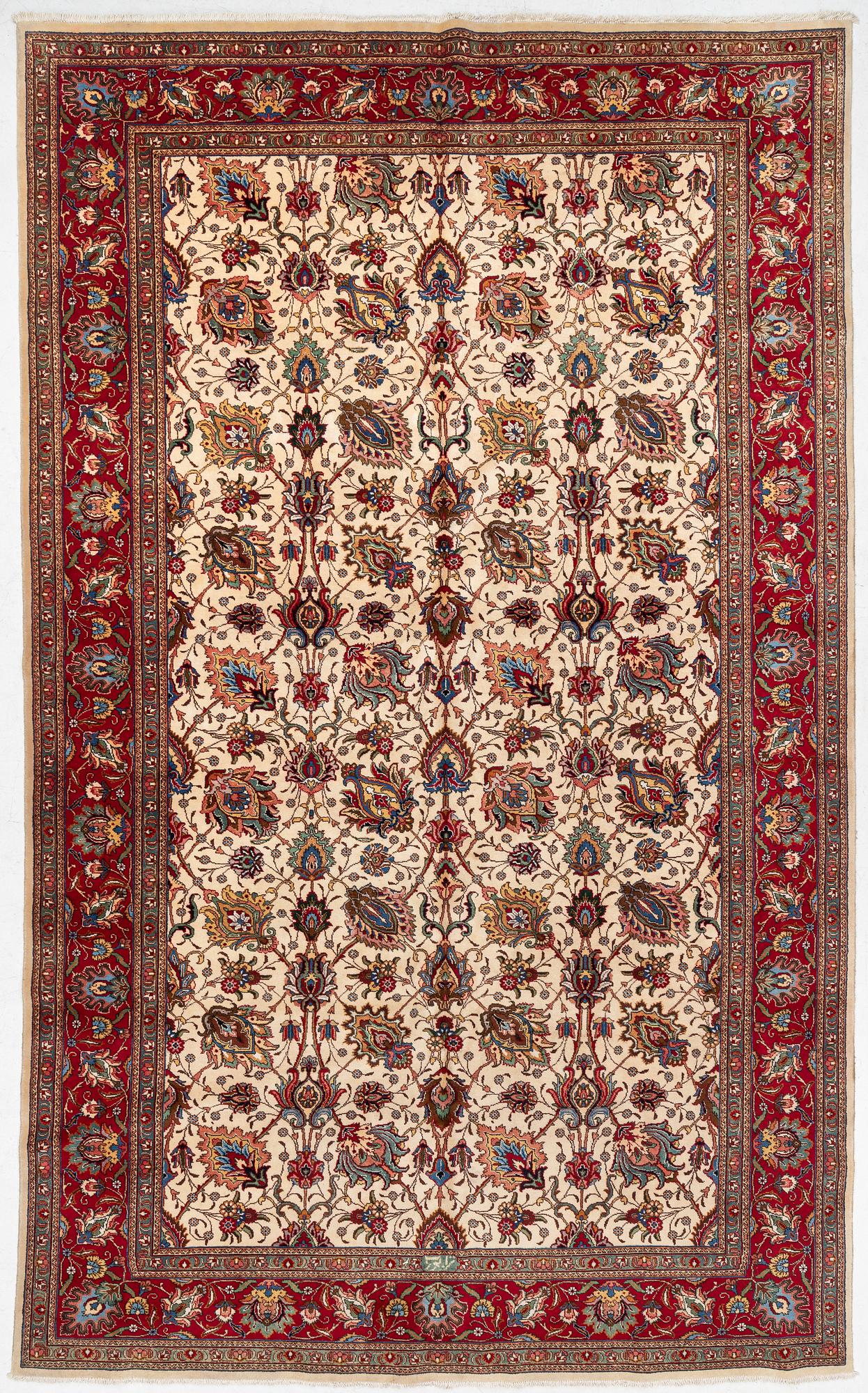 A Tabriz carpet, Northwestern Iran, of Safavid 'palmette' design, c, 483 x 302 cm.