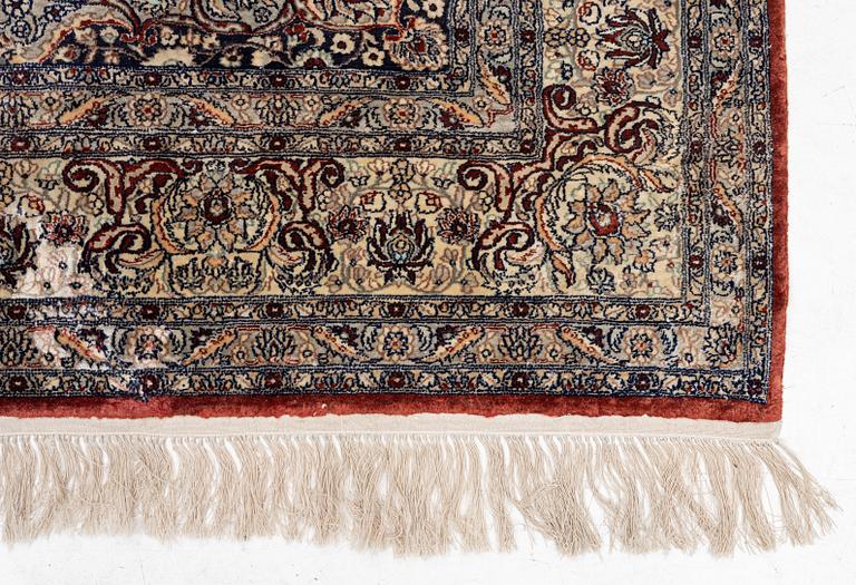 Carpet, part silk, approx. 240 x 158 cm.