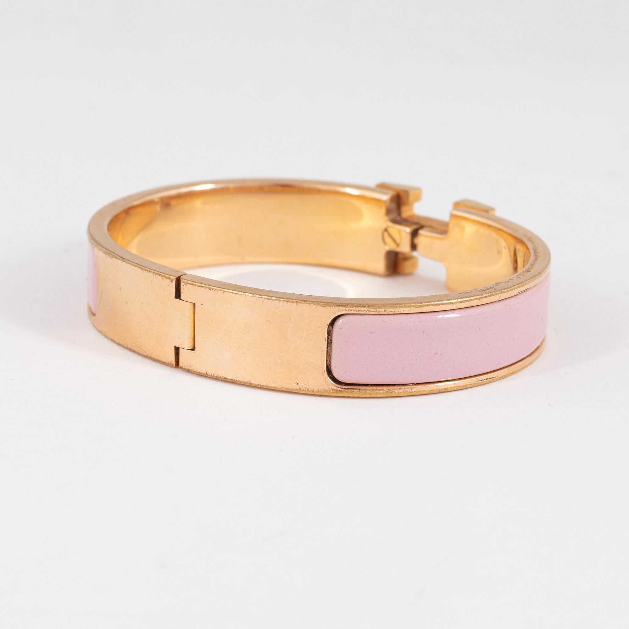 Hermès, a 'Clic H PM' bracelet.