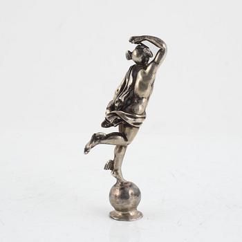 A Silver Figurine.