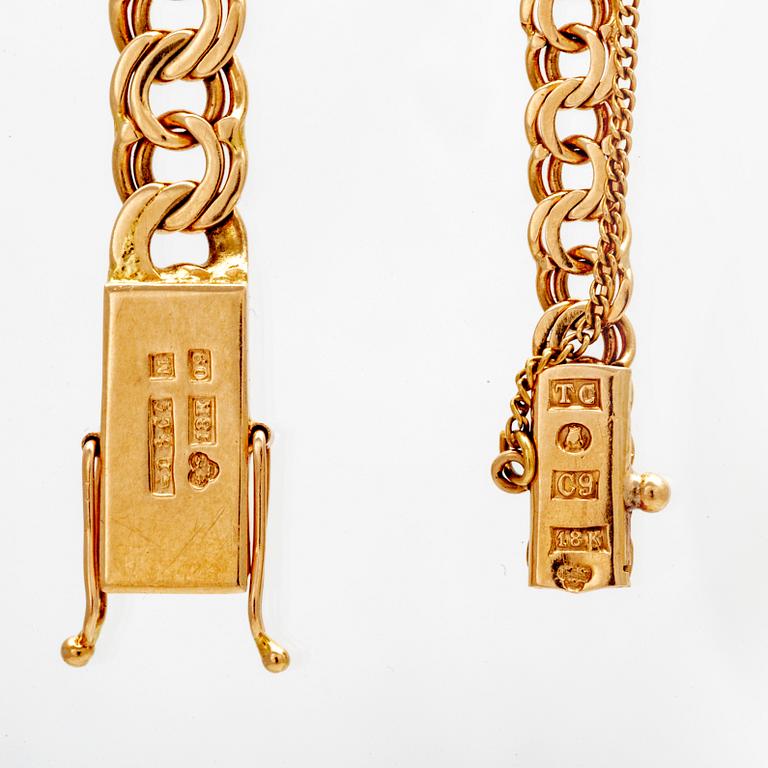 Armlänkar, 2 st. 18K guld, bismarck.