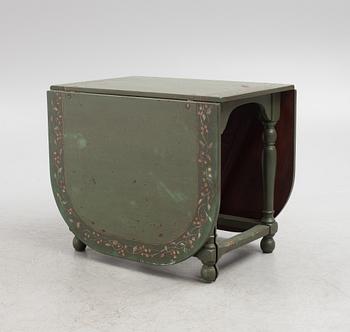 A painted gate leg  table, 19th century.