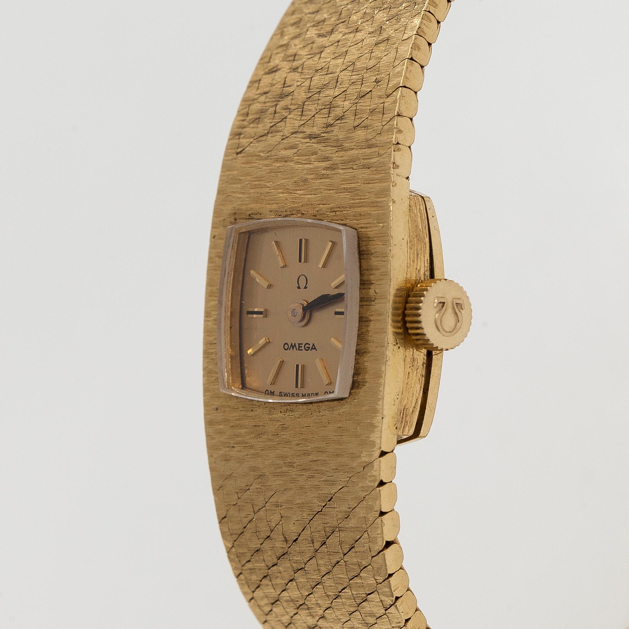 Omega, wristwatch, 18K gold, manual, plexiglass.