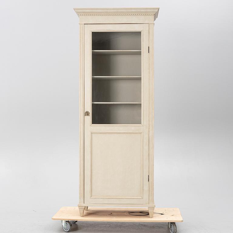 Display cabinet, early 20th century.