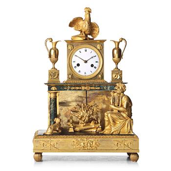 130. A French Empire early 18th century mantel clock.