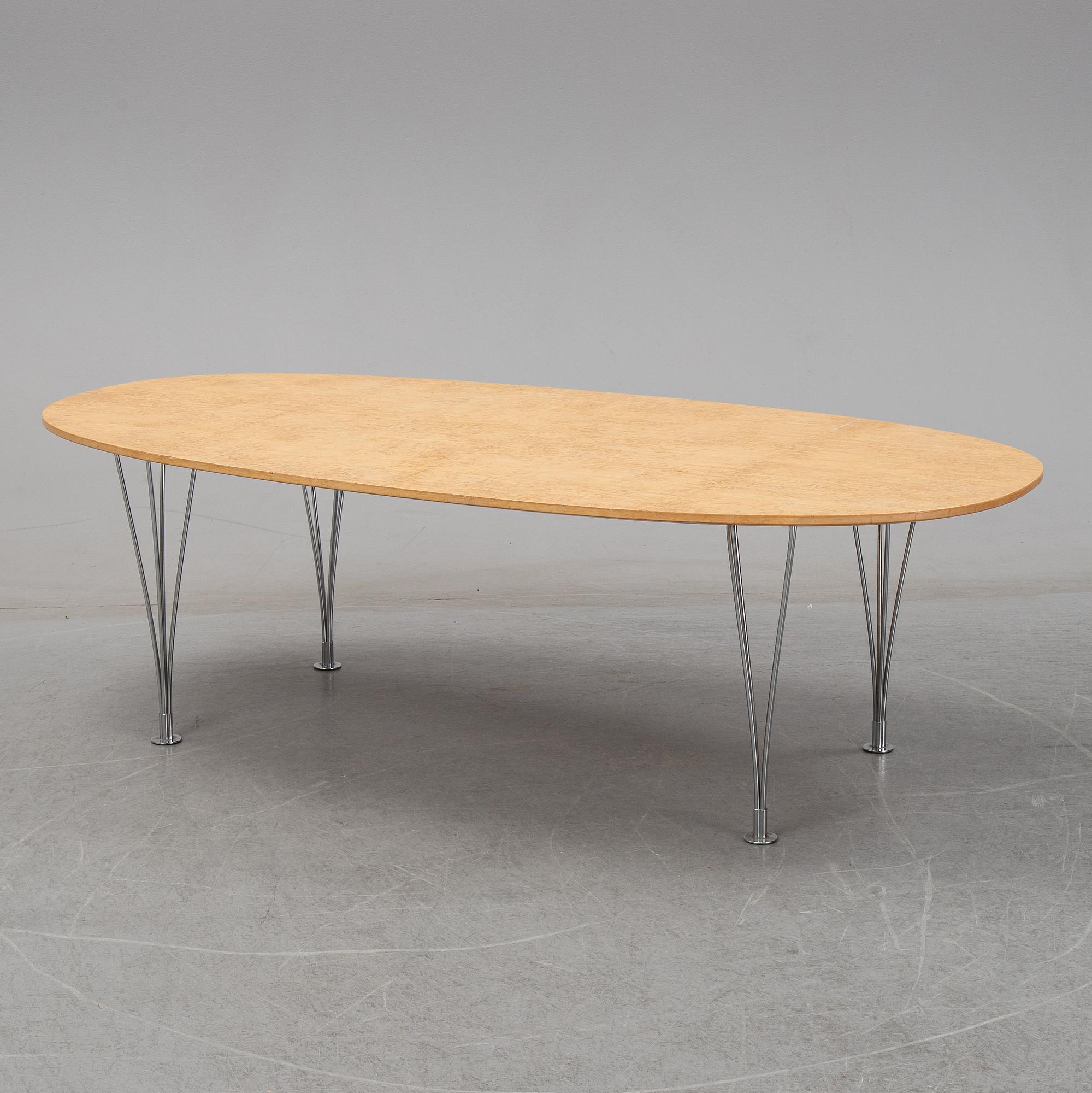 A 'Super-elliptical' birch coffee table by Piet Hein & Bruno Mathsson for Fritz Hansen.