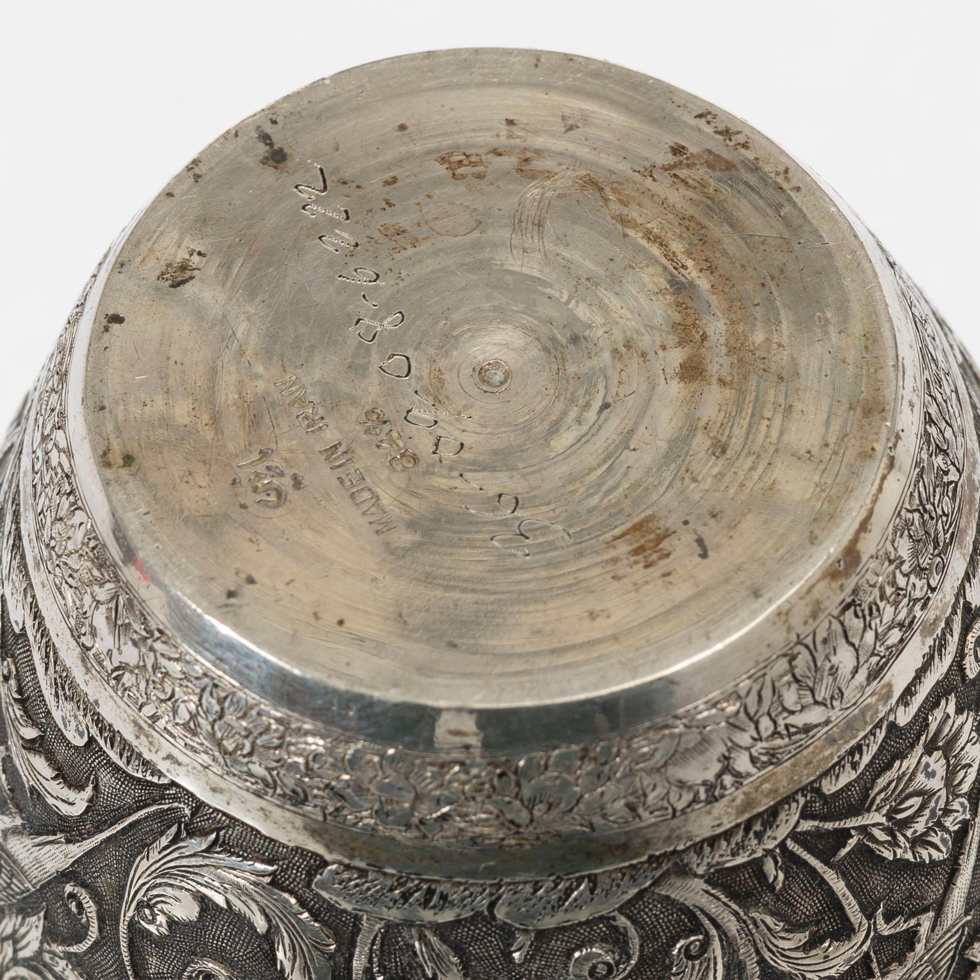 A Persian silver vase, 20th century.