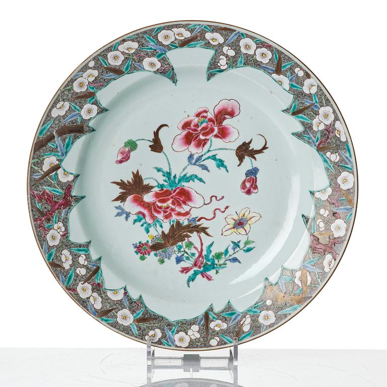 Two famille rose serving dishes and six dinner plates, Qing dynasty, Qianlong (1736-95).