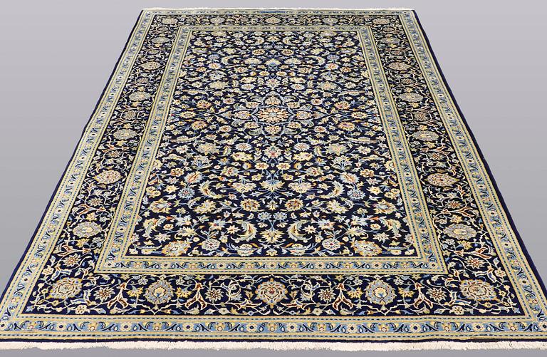 A carpet, Keshan, 291 x 190 cm.