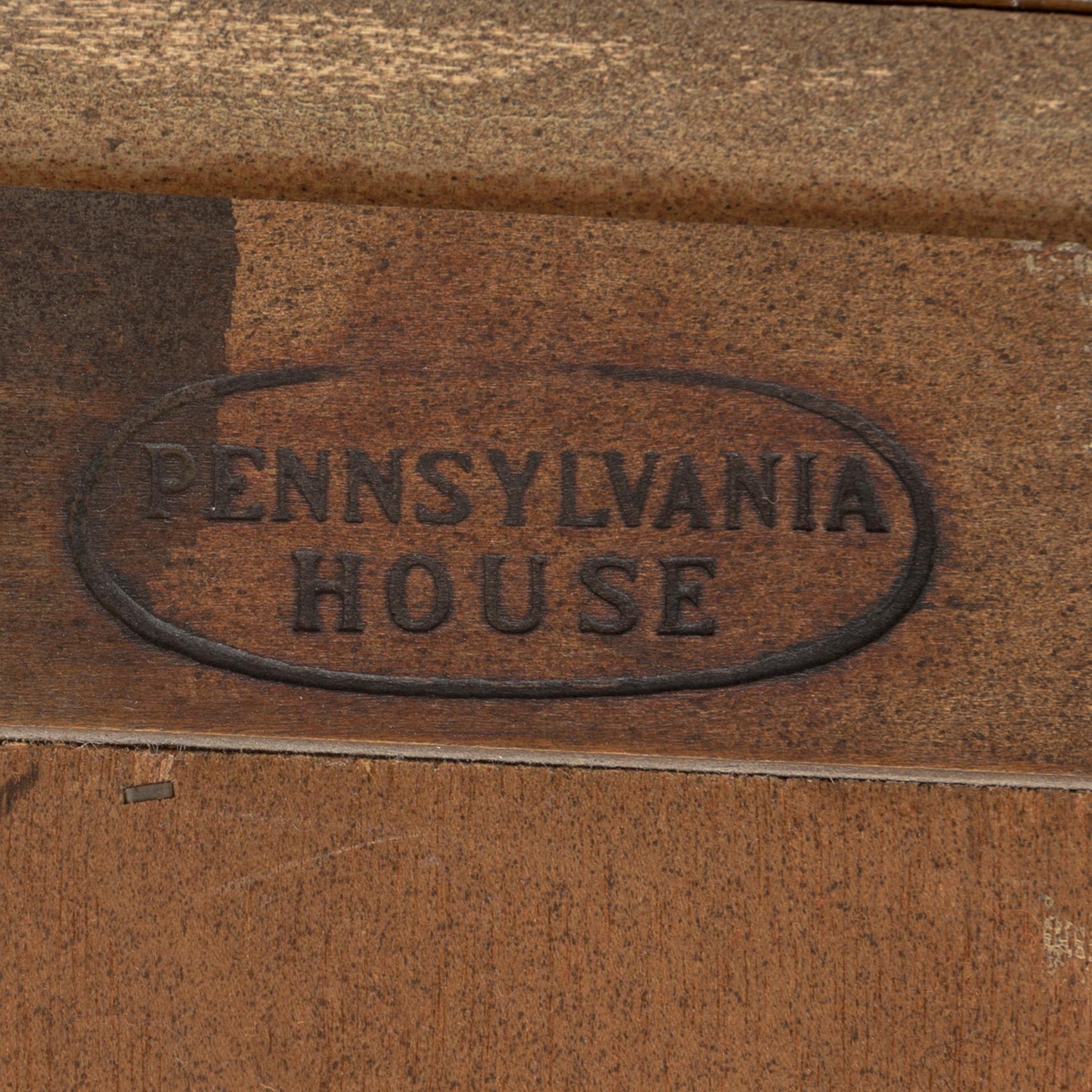 A second half of the 20th century vitrine cabinet marked "Pennsylvania House".