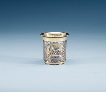 A RUSSIAN SILVER-GILT AND NIELLO BEAKER, un identified makers mark, Moscow 1835. Monument with Minin and Pozharsky.