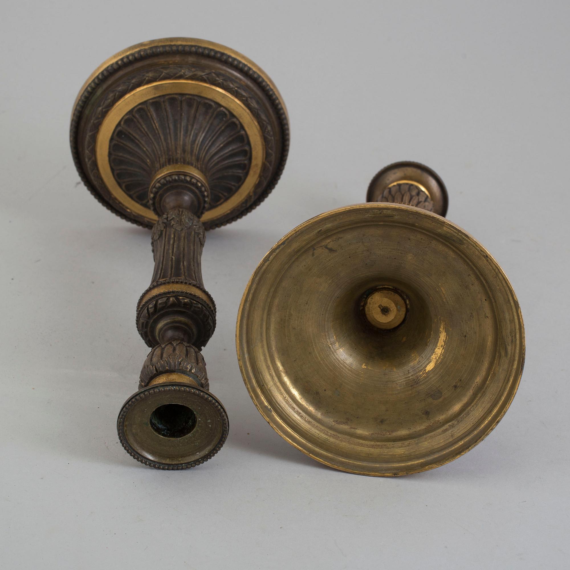 A pair of late 18th century Louis XVI bronze candlesticks, France.