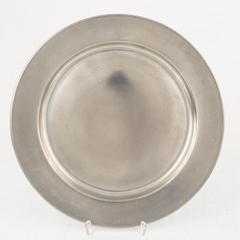 Svenskt Tenn, eight pewter charger plates, Stockholm 1950s-70s.