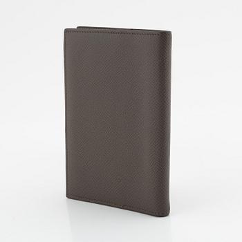 Hermès, notebook with leather case.