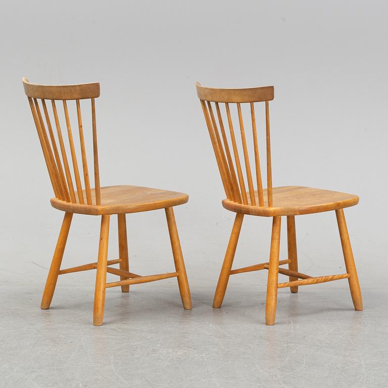 A set of eight 'Lilla Åland' birch chairs by Carl Malmsten for Stolab dated 1996.